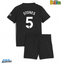 Manchester City John Stones #5 Bortedraktsett Barn 2025-26 Kortermet (+ Korte bukser)